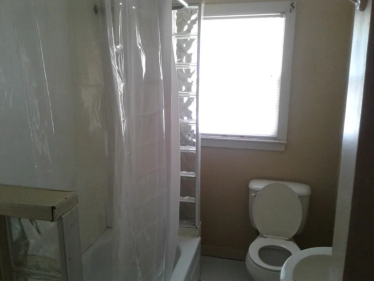 Decorative glass blocks accent the tub end walls!