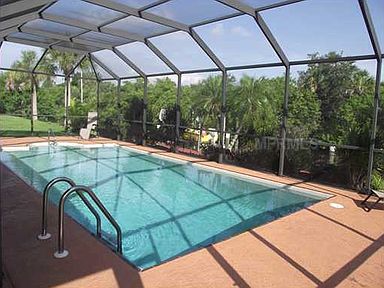 Huge pool & cage cover patio