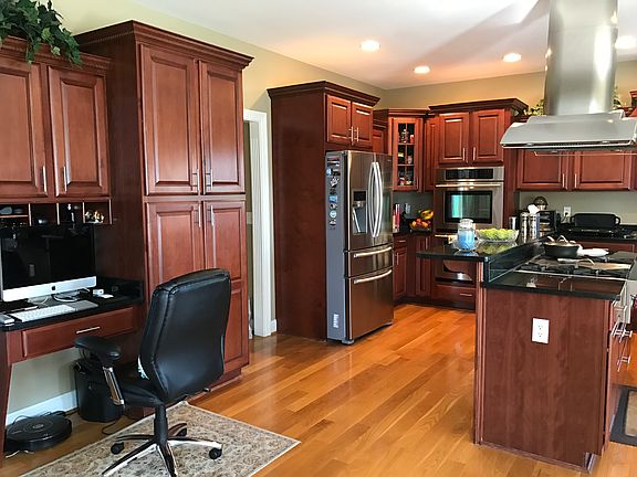 Cherry-finished cabinets