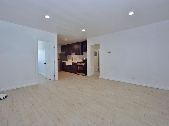 Completely upgraded unit, in-unit laundry machines, updated flooring, updated kitchen, new windows throughout, updated bathroom, mini split AC, etc.