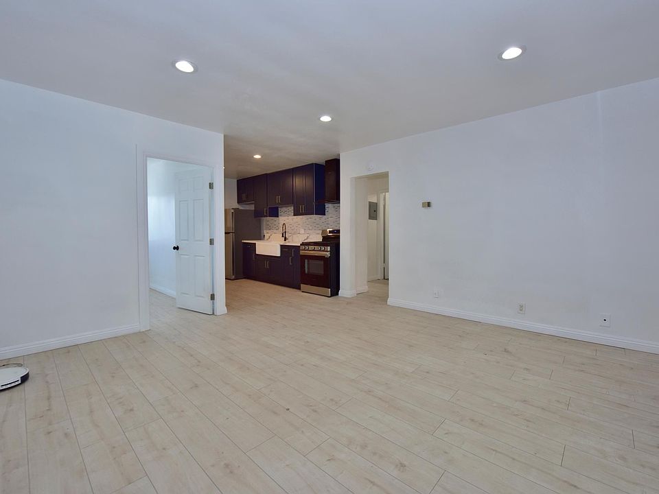 Completely upgraded unit, in-unit laundry machines, updated flooring, updated kitchen, new windows throughout, updated bathroom, mini split AC, etc.