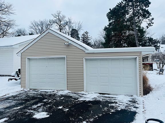 2 stall garage with garage door openers, 25 ft from the french doors to the house.