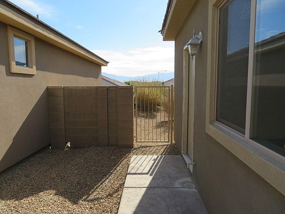 Side view of home w/fence