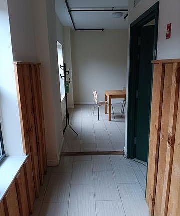 Entry into apartment...laundry room to right