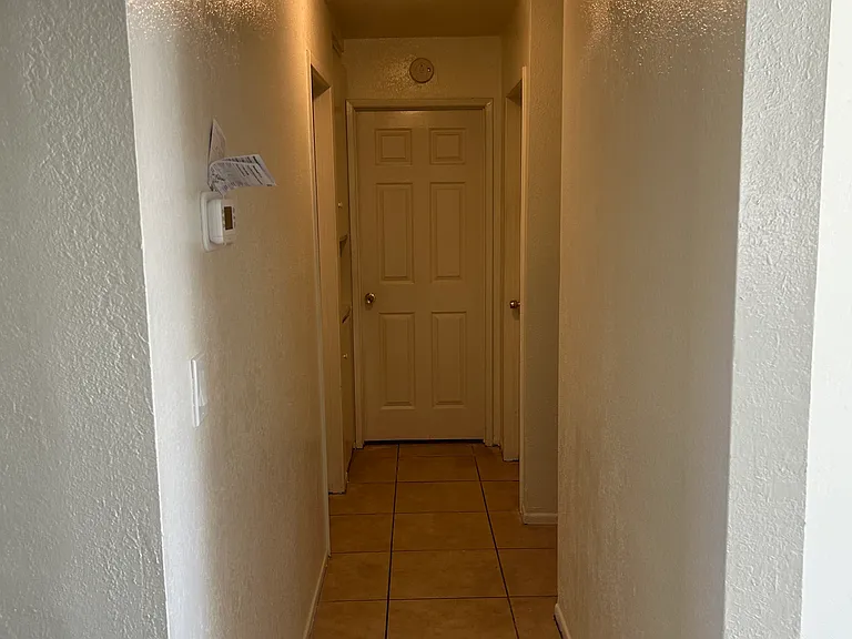 THE HALL TO THE BEDROOMS