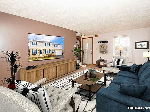 The Living has been Virtually staged so you can see the great design possibilies!