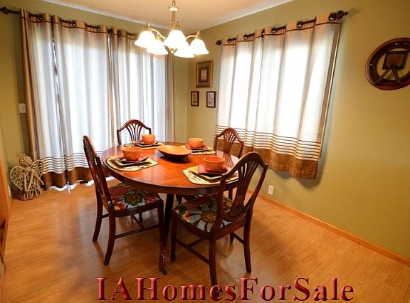 Dining Area: Step up into dining area from kitchen and living area, with walk out to deck