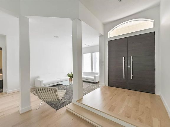 A generously spaced entrance invites you to this light-filled home.