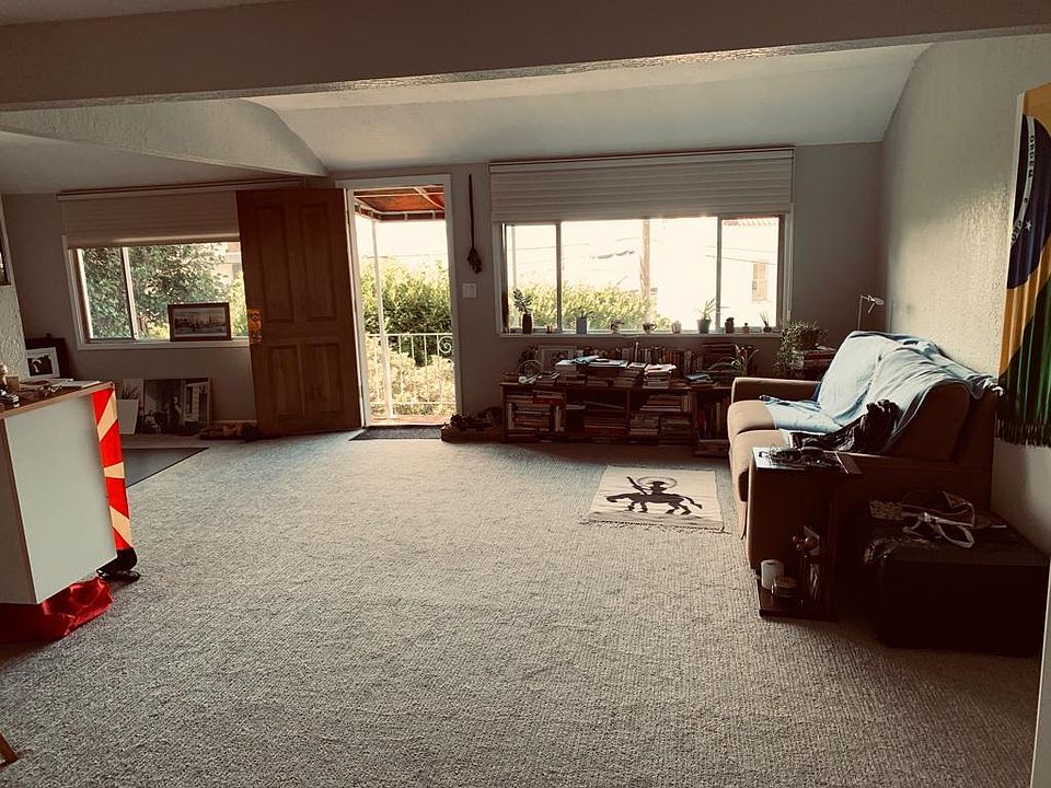 Living room with pull-out couch that we prefer to remain.