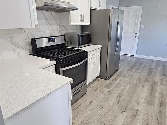 4th image of 5073-5075 Leo St