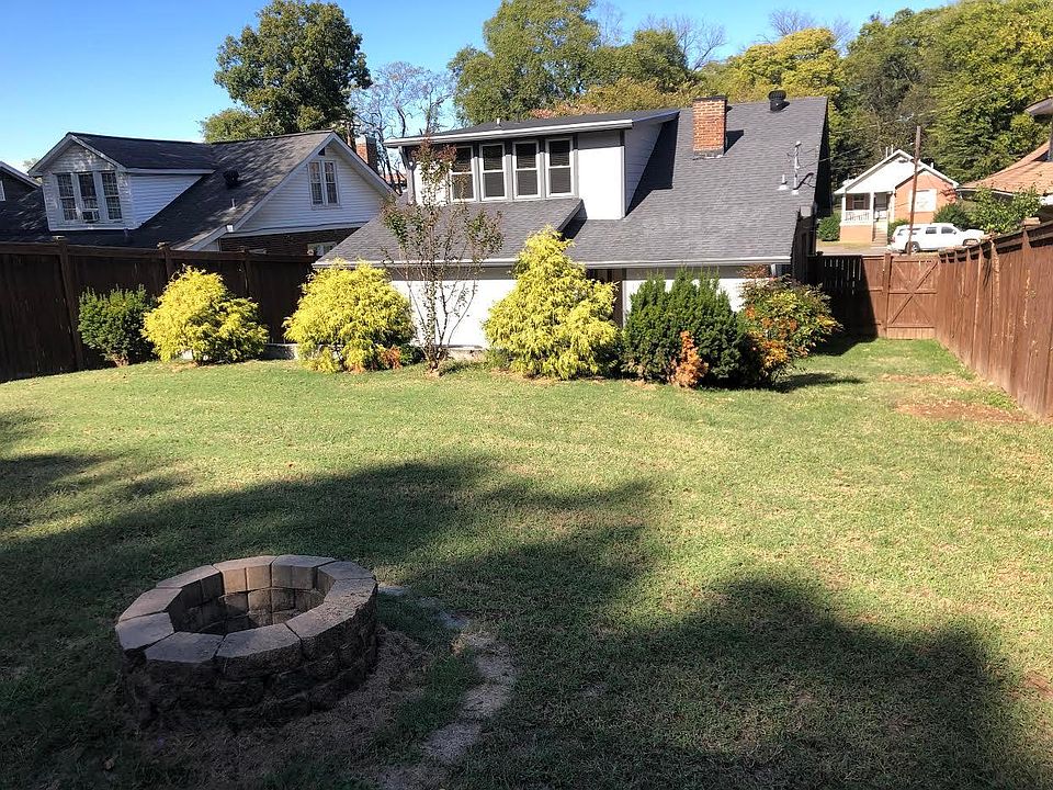 The fenced in yard has a fire pit and a stone patio which can't seen in this picture.
