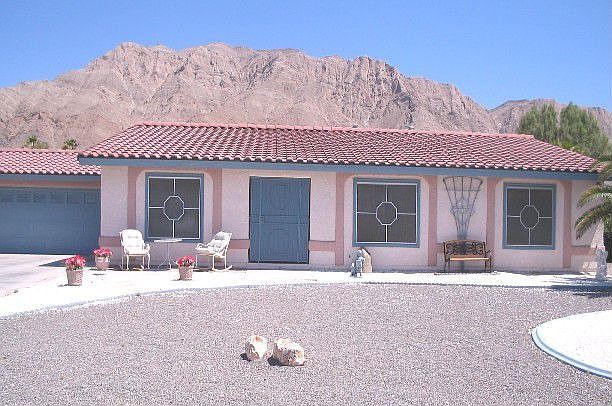Front view with Sunrise Mountain in the background
