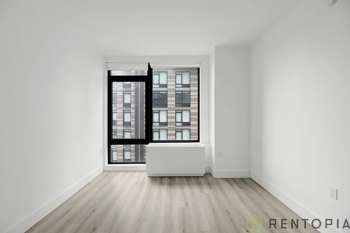 Building Photo - 224 E 135th St #216S