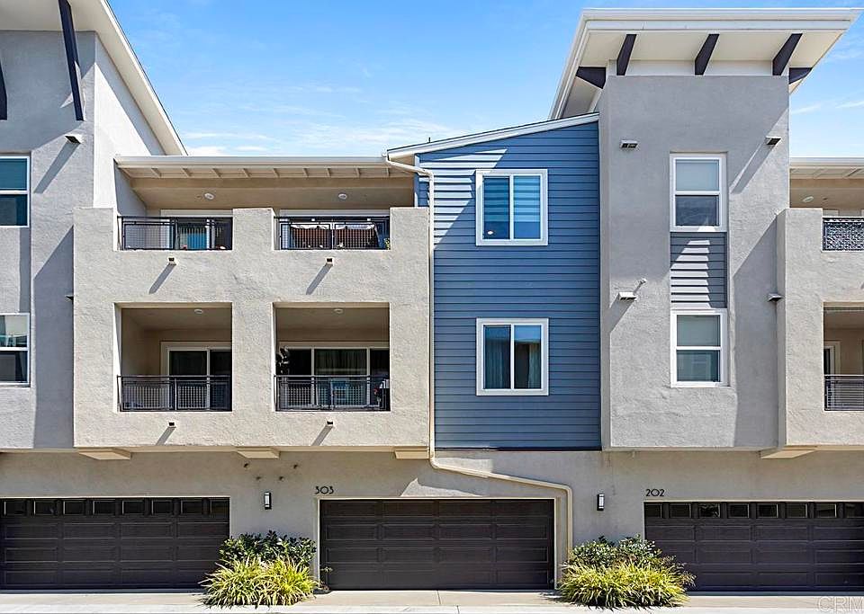 Middle garage and unit patio is on top floor