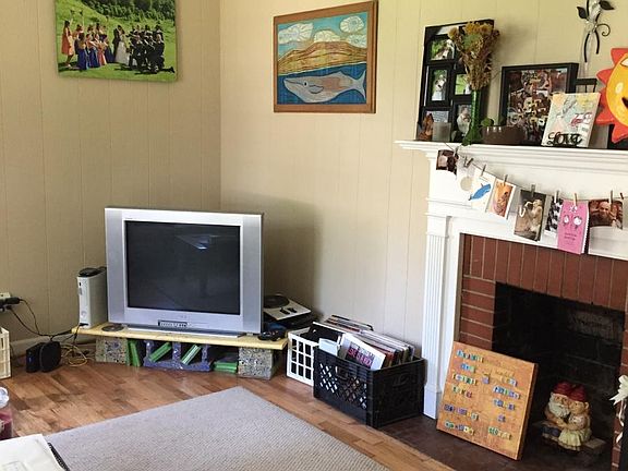 Living room with working fireplace