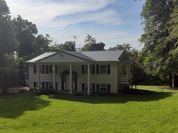 Spacious front yard, woods around