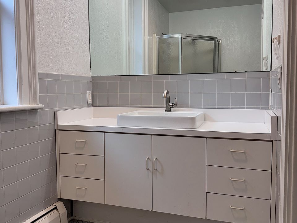 Updated bath with new sink and lighting