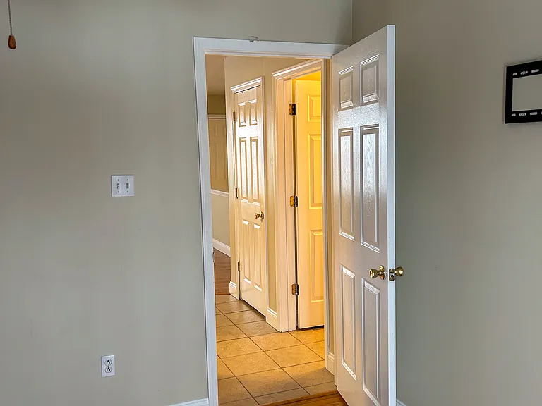 View from Master Bedroom looking into Bath and Kitchen