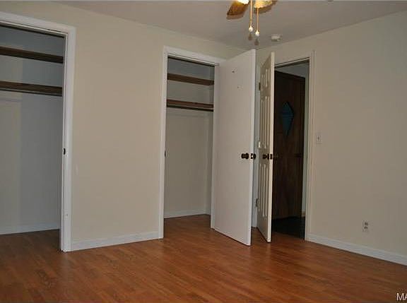 Master Bedroom with her and his closet