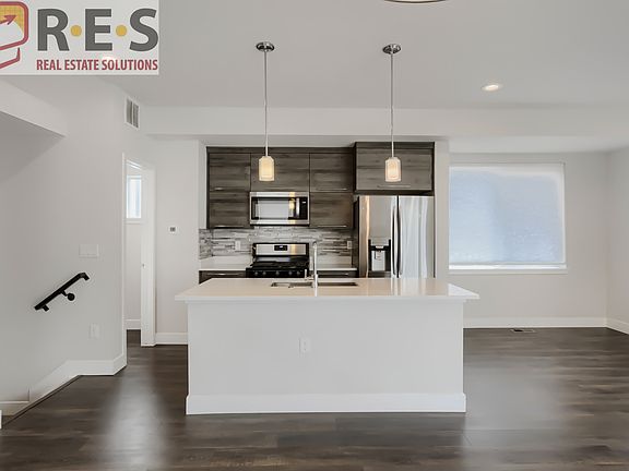3rd image of 5566 W 11th Pl
