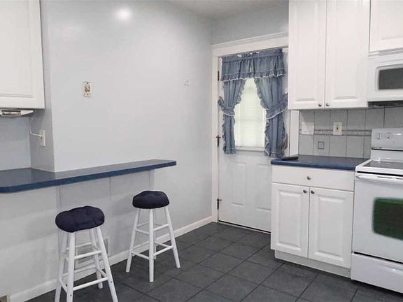 4th image of 8931 Burton Ave