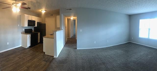Kitchen/dining area and living room.