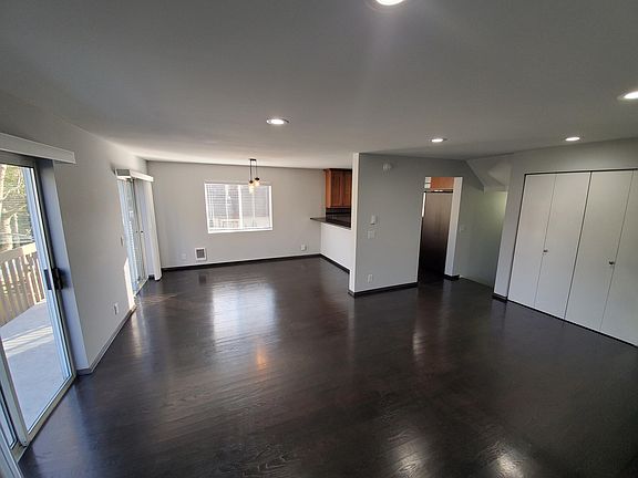 Living room & Dining Room with rich hardwood floors