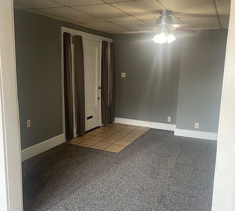 New carpet and curtains installed for privacy.