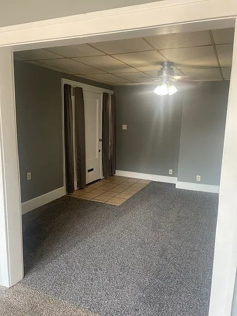 New carpet and curtains installed for privacy.