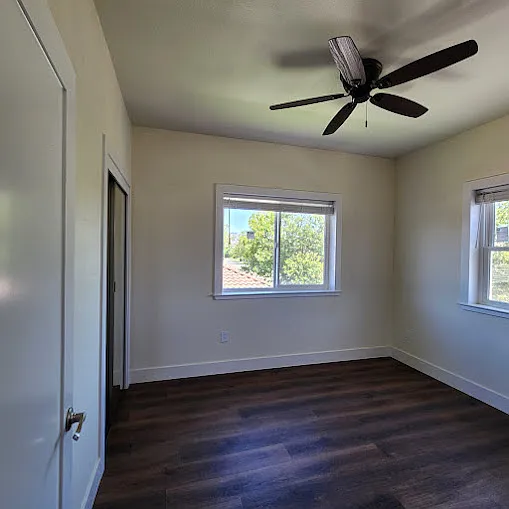 Master Bedroom (#2) with a closet with mirror doors on left wall in the 2nd story.