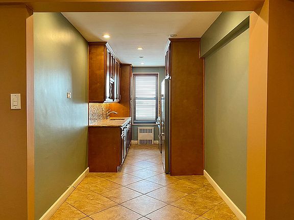 4th image of 8385 Woodhaven Blvd APT 5S