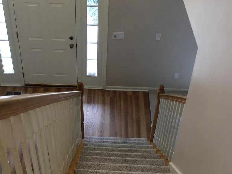 Stairs to the upper floor; new carpet