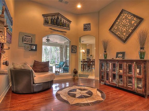 Formal living room with picture window and cherry hardwood floors!