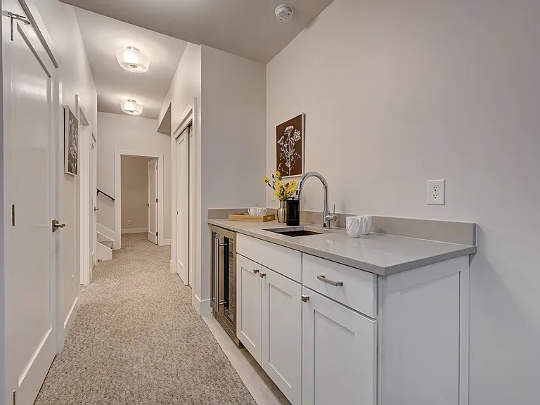 Wet Bar and Refreshment Refrigerator in Lower Level Recreation Room