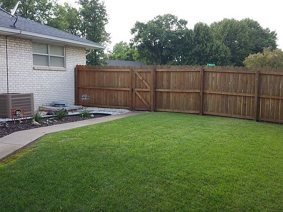 Large back yard with privacy fencing