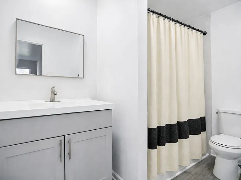 Step into the elegant bathrooms at Sunnybrae Apartments, featuring modern fixtures and a sleek design. Enjoy the perfect blend of style and comfort in your new home. Don't waitschedule your tour today to see it all for yourself!