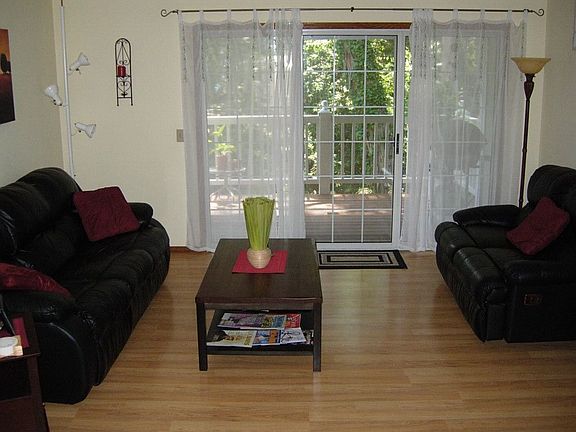 Living room which opens to large private deck.