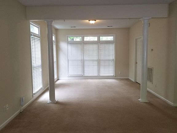 Living and Dining Room showing the transom windows around the DR area