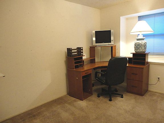One of the secondary bedrooms - each bedroom features large windows and great closet space.