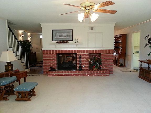 Living Room from back doors, Fireplace (gas or wood) open to this room and Dining Room.