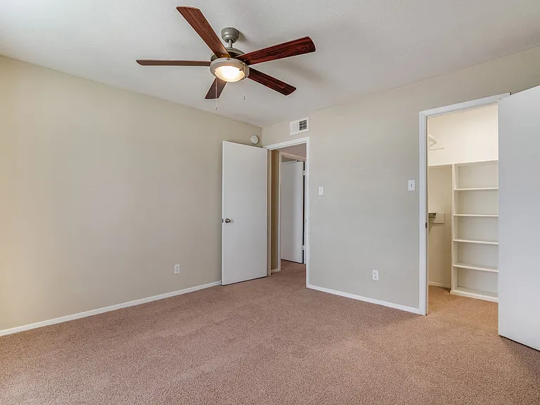 Built-in shelving in large closets