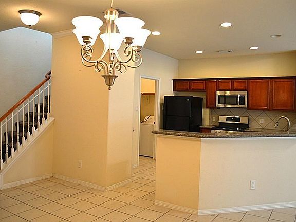 Light & Bright Kitchen! Notice the Utility Room with Access