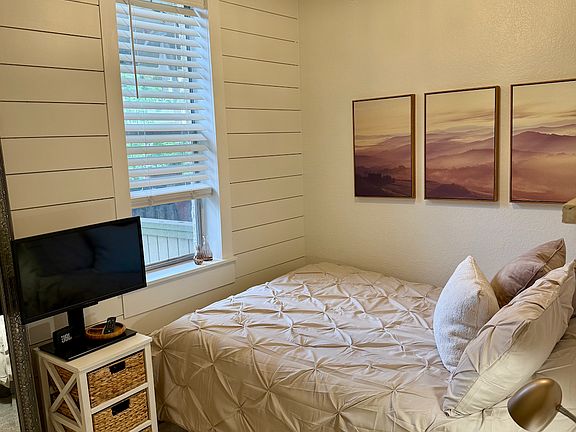 Bedroom 1 with Full bed- Both bedrooms have smart TVs!