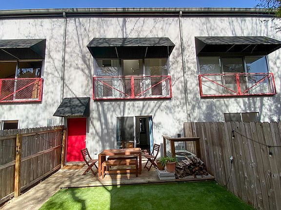 Juliet balcony with sliding glass doors overlooking the backyard