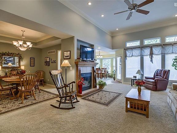 Great Room w/ FP and Wall of Windows