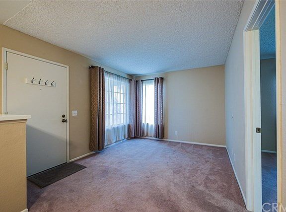 Room living room, newer carpet, lots of natural light