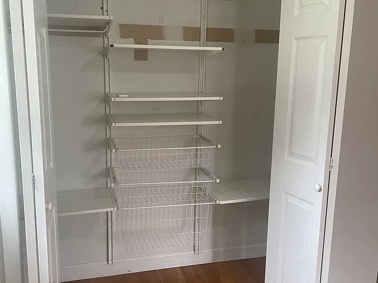 Closet in front bedroom with organizers.