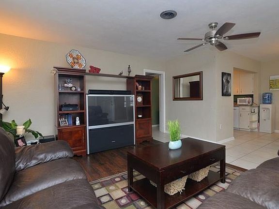 Living Room with BRAND NEW Wood Laminate Floors!