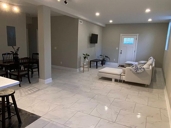 Current living room with new tile floor
