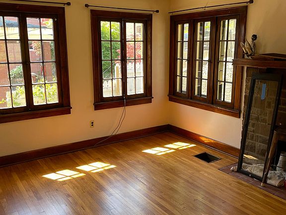 Tons of natural light, wood floors and original trim!